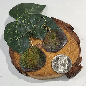 War of the Rose Petal Earrings Overhead on Wood with Size Comparison